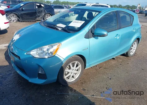 2014 Toyota Prius C Three z USA, uszkodzony, nr VIN JTDKDTB32E1073930